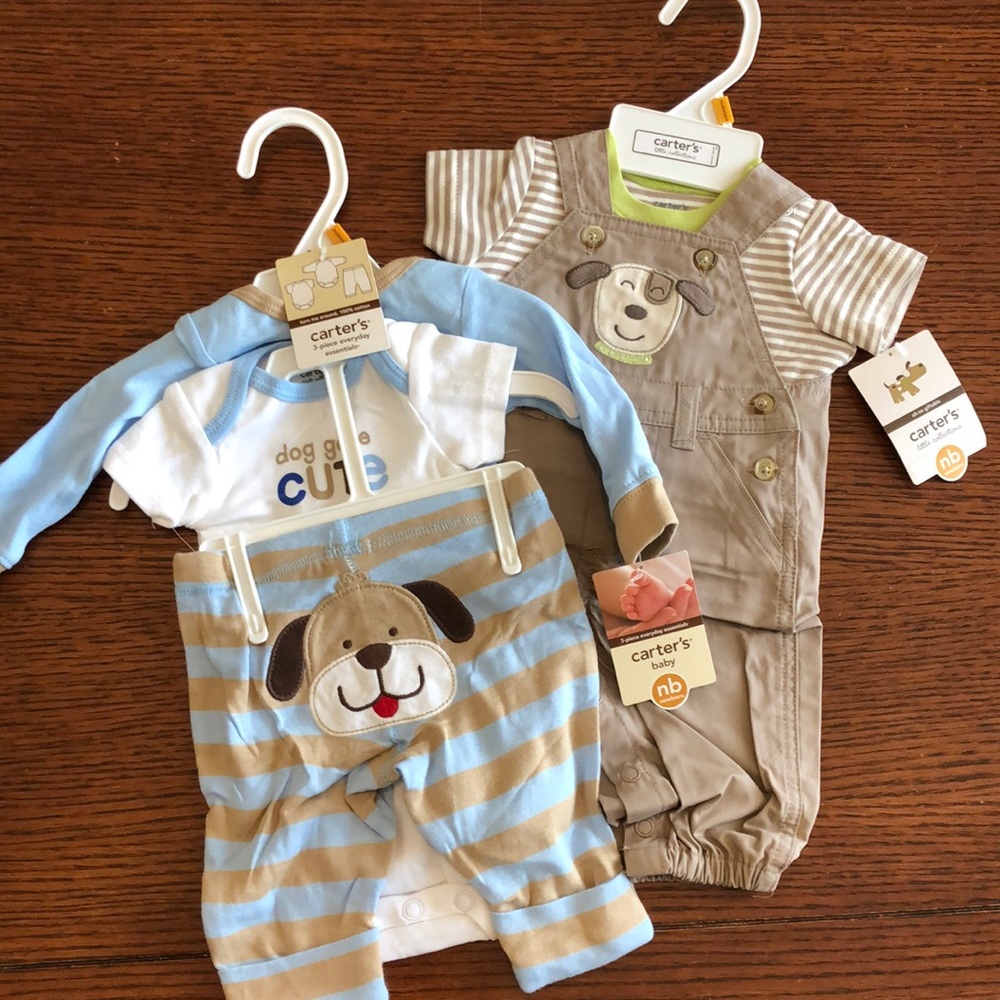 2 NWT newborn Carters Boy sets.